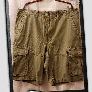 Army green shorts.